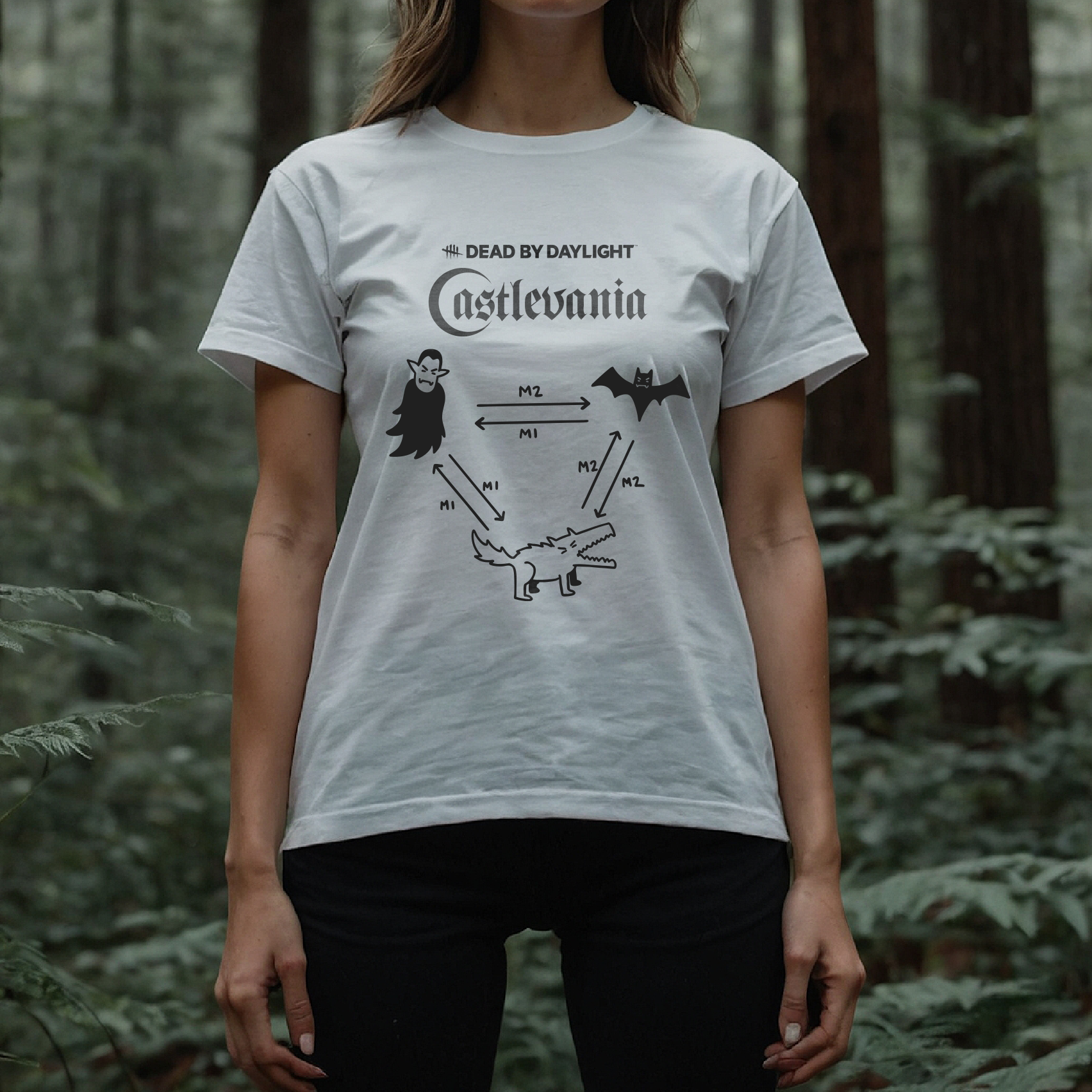 Woman wearing a white t-shirt with a graphic design in a forest setting