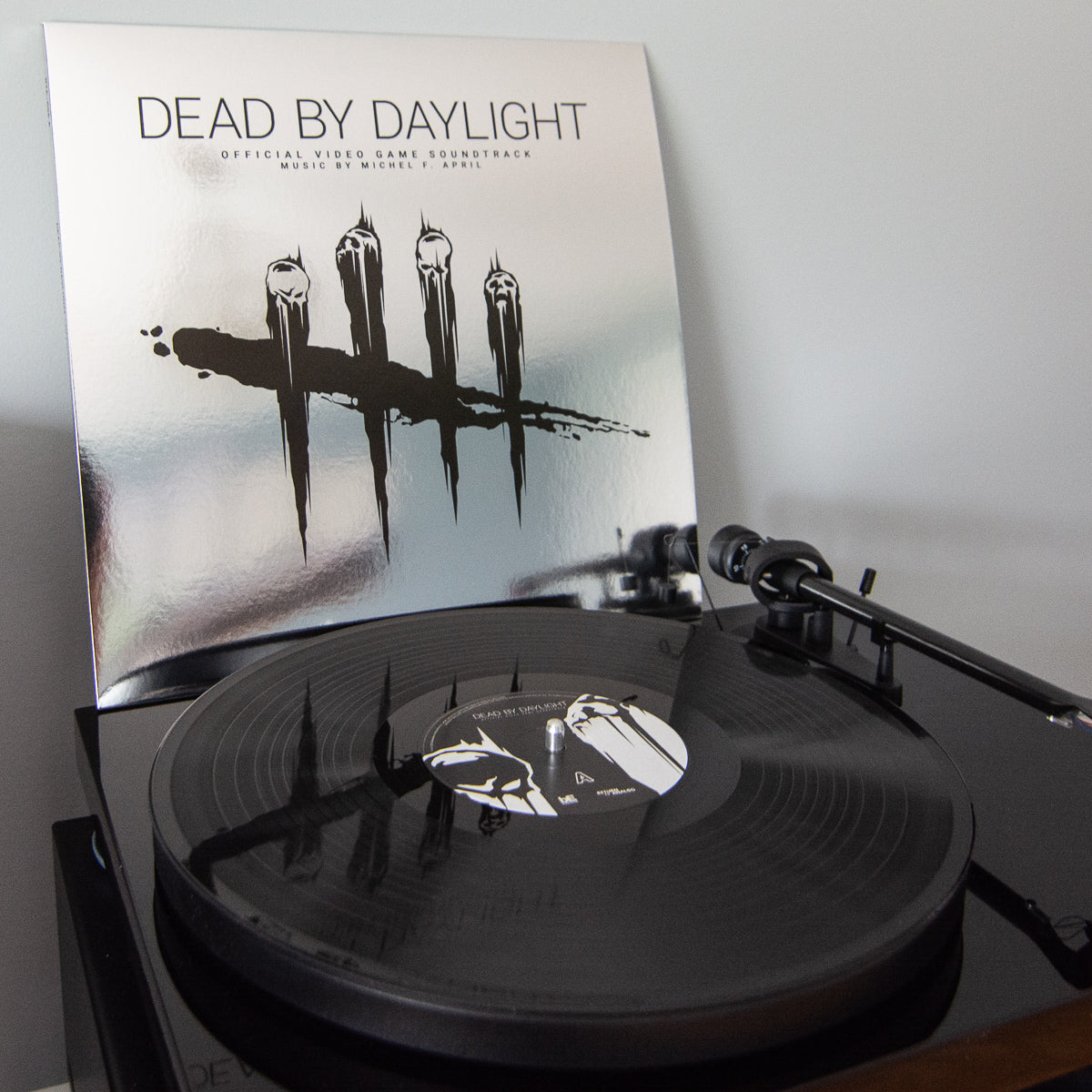 Vinyl record with 'Dead by Daylight' cover on a turntable